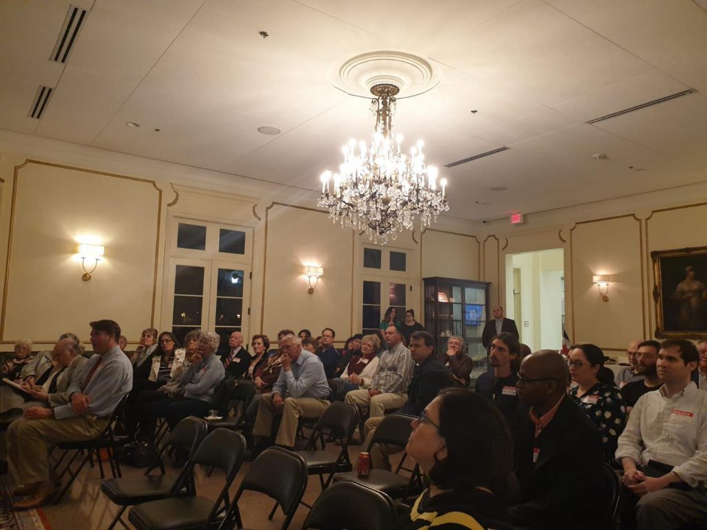 Crowd of attendees at the LSU French House